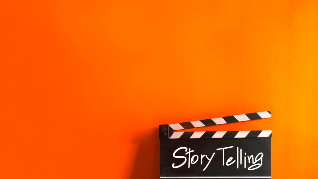 Bright orange background with a movie scene sign that says "storytelling"